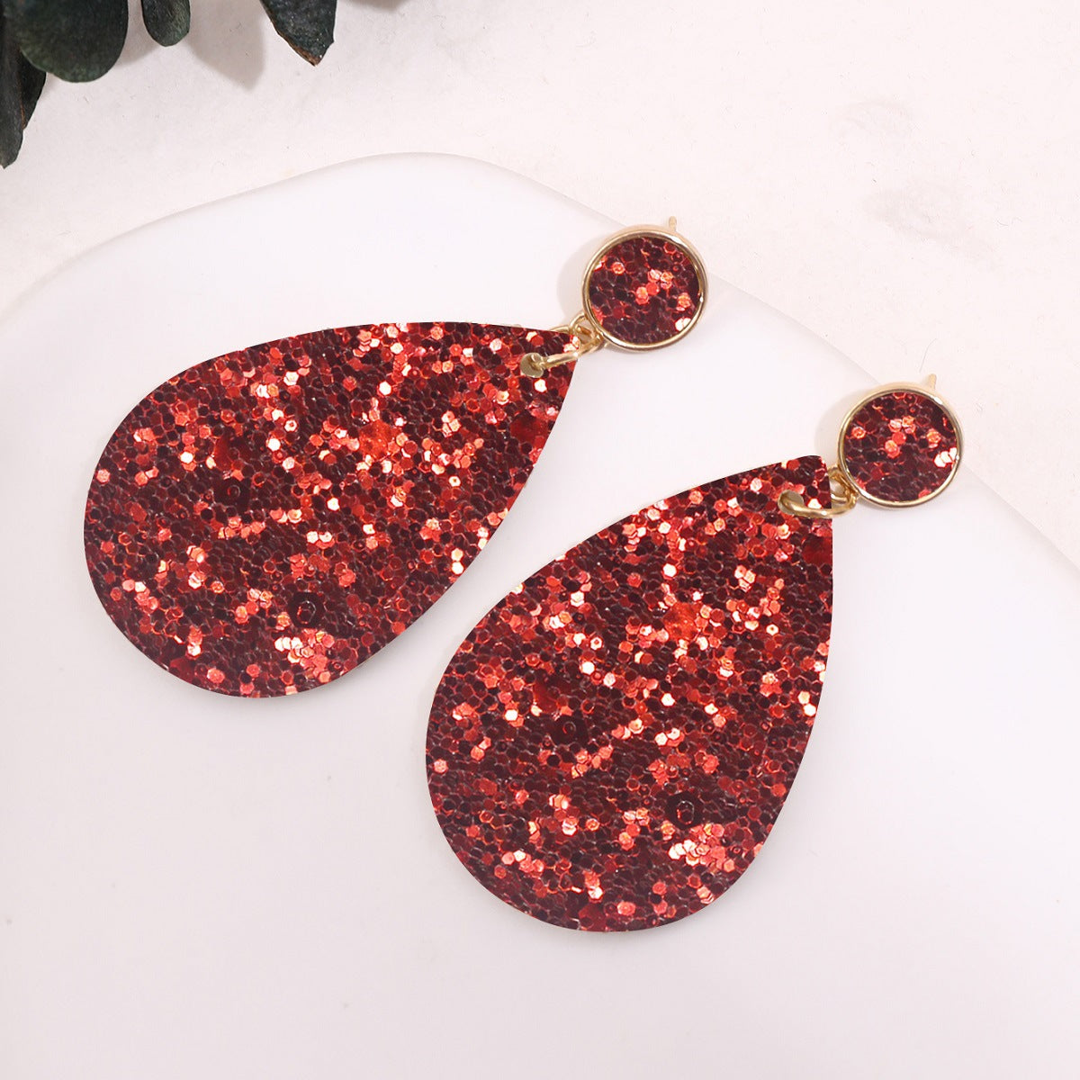 Pendientes de forma de plato de cuero con brillo de oro por mayor